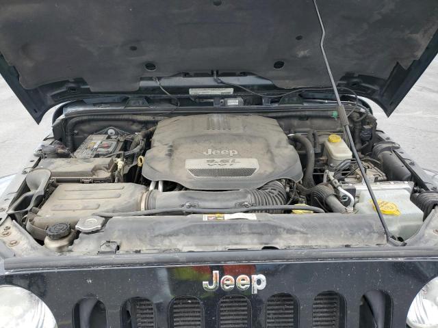 1C4BJWEG8CL217202 - 2012 JEEP WRANGLER U SAHARA BLACK photo 12