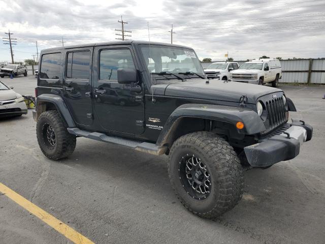 1C4BJWEG8CL217202 - 2012 JEEP WRANGLER U SAHARA BLACK photo 4