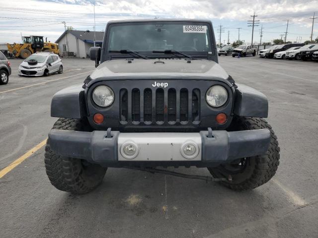 1C4BJWEG8CL217202 - 2012 JEEP WRANGLER U SAHARA BLACK photo 5