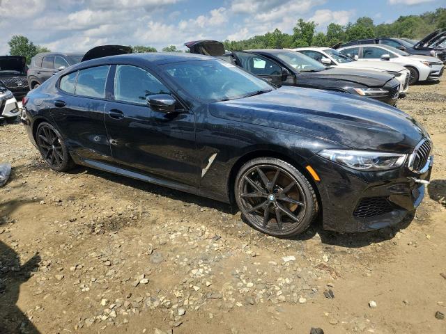 WBAGV4C04NCJ21085 - 2022 BMW 840XI BLACK photo 4