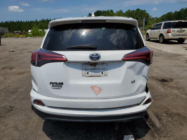 2T3ZFREV0JW447150 - 2018 TOYOTA RAV4 LE WHITE photo 6