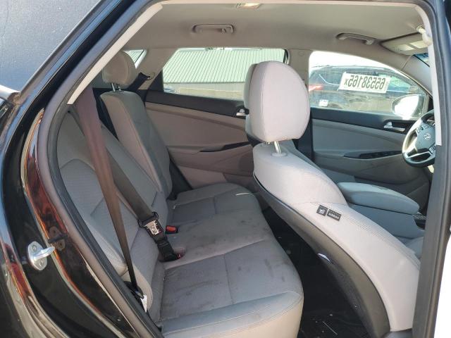 KM8J2CA45KU866852 - 2019 HYUNDAI TUCSON SE Schwarz Foto 11