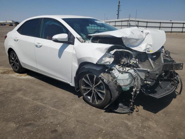 5YFBURHE0KP861060 - 2019 TOYOTA COROLLA L WHITE photo 4