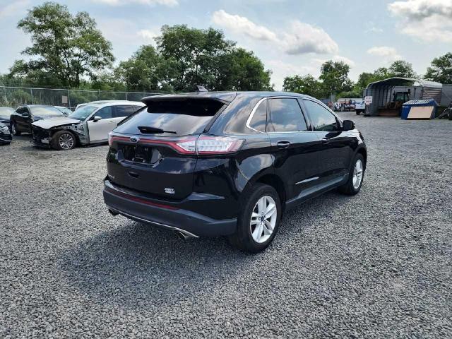 2FMPK4J95HBC24464 - 2017 FORD EDGE SEL BLACK photo 4