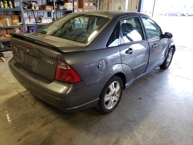 1FAFP38Z35W102588 - 2005 FORD FOCUS ZX4 ST GRAY photo 4