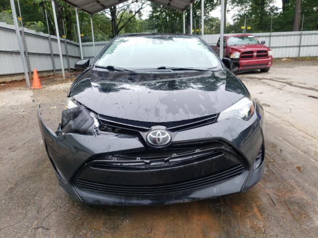 5YFBURHE9KP943224 - 2019 TOYOTA COROLLA L შავი ფოტო 5