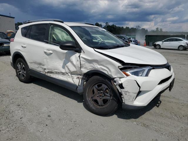 JTMBFREV3HJ106402 - 2017 TOYOTA RAV4 LE WHITE photo 4