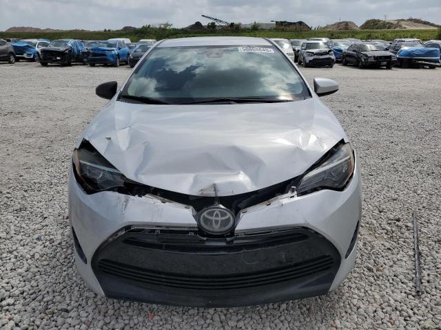 5YFBURHE8KP872565 - 2019 TOYOTA COROLLA L SILVER photo 10