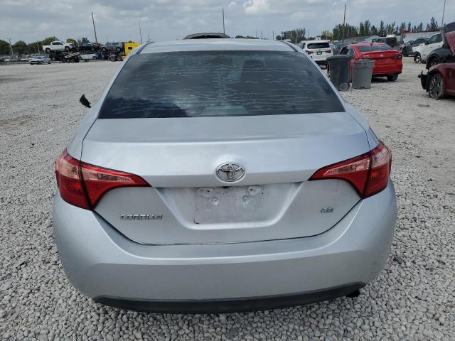 5YFBURHE8KP872565 - 2019 TOYOTA COROLLA L SILVER photo 12