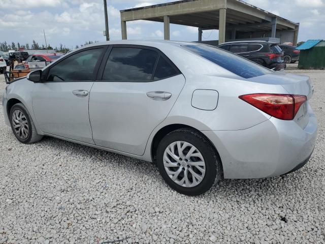 5YFBURHE8KP872565 - 2019 TOYOTA COROLLA L SILVER photo 4
