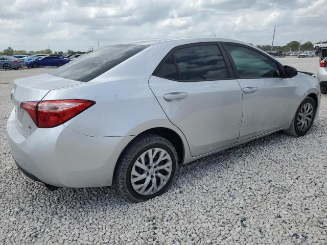 5YFBURHE8KP872565 - 2019 TOYOTA COROLLA L SILVER photo 6
