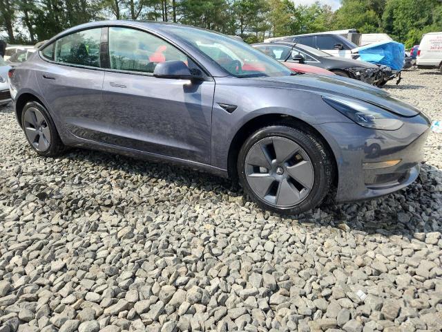 5YJ3E1EA6PF665020 - 2023 TESLA MODEL 3 Сірий фото 4