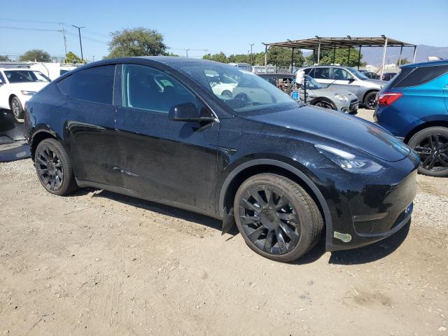7SAYGDEE1PA110268 - 2023 TESLA MODEL Y Սև լուսանկար 4