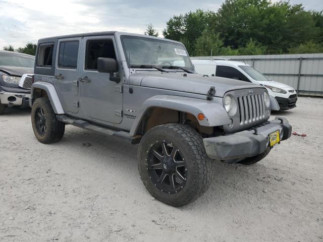 1C4BJWEG0GL149578 - 2016 JEEP WRANGLER U SAHARA SILVER photo 4