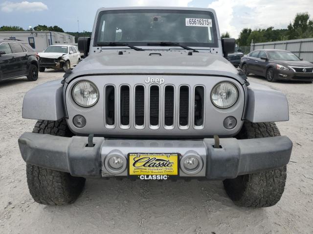 1C4BJWEG0GL149578 - 2016 JEEP WRANGLER U SAHARA SILVER photo 5