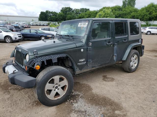 1J4BA5H10AL214948 - 2010 JEEP WRANGLER UNLIMITED SAHARA შავი ფოტო 1