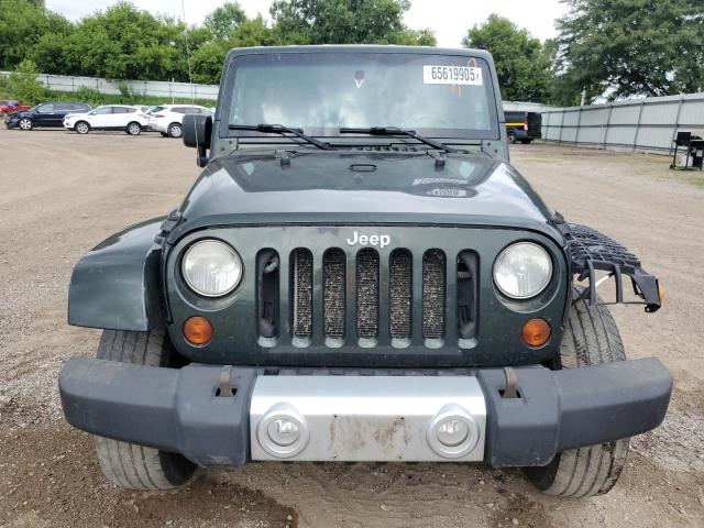 1J4BA5H10AL214948 - 2010 JEEP WRANGLER UNLIMITED SAHARA შავი ფოტო 5