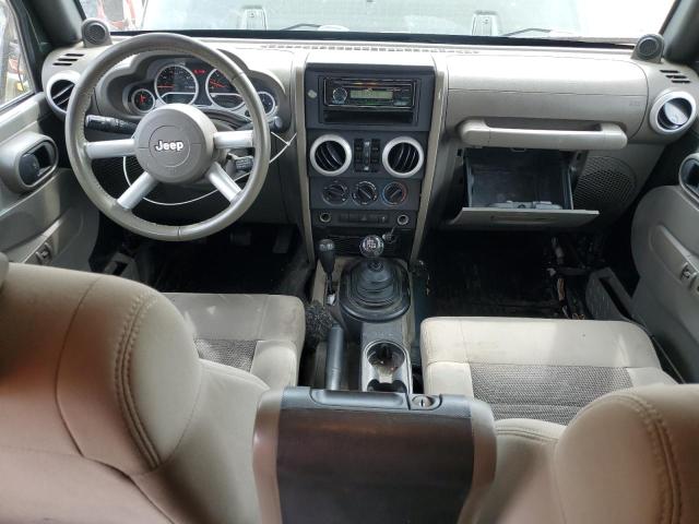 1J4BA5H10AL214948 - 2010 JEEP WRANGLER UNLIMITED SAHARA შავი ფოტო 8