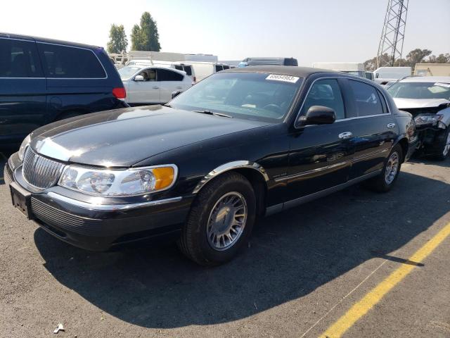 1L1FM81W2XY644494 - 1999 LINCOLN TOWN CAR EXECUTIVE BLACK photo 1