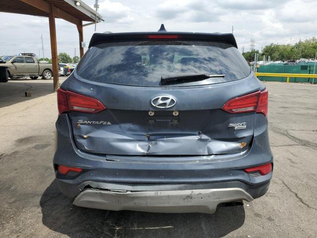 5NMZUDLB2HH014994 - 2017 HYUNDAI SANTA FE S BLUE photo 6