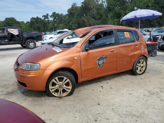 KL1TD66636B665026 - 2006 CHEVROLET AVEO BASE ORANGE photo 1