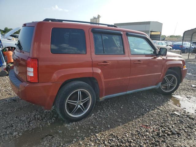 1J4NT2GAXAD518886 - 2010 JEEP PATRIOT SPORT ORANGE photo 3