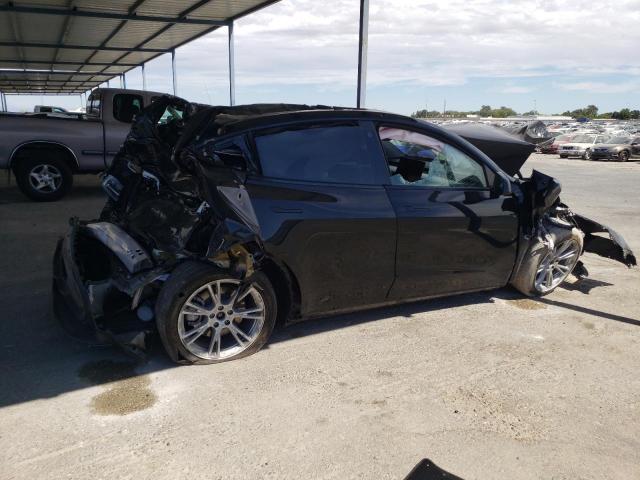 7SAYGAEE1PF744309 - 2023 TESLA MODEL Y შავი ფოტო 3