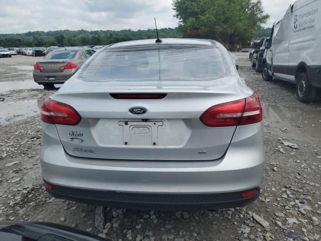 1FADP3F2XJL262248 - 2018 FORD FOCUS SE Silber Foto 6