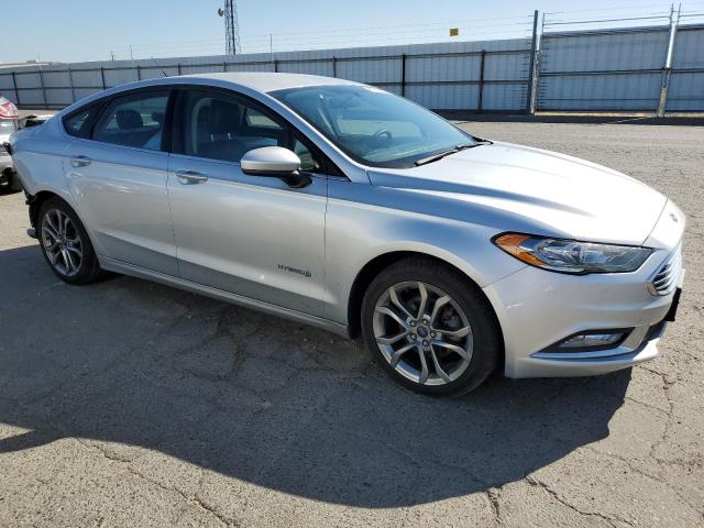 3FA6P0LU6HR232687 - 2017 FORD FUSION SE HYBRID SILVER photo 4