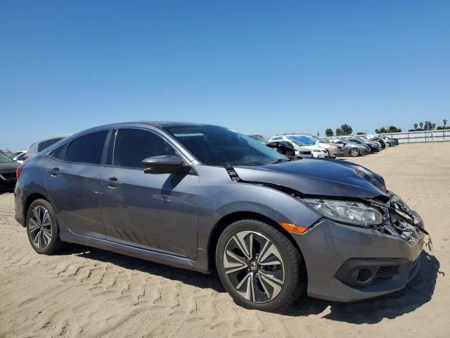 JHMFC1F39JX037550 - 2018 HONDA CIVIC EX ნაცრისფერი ფოტო 4