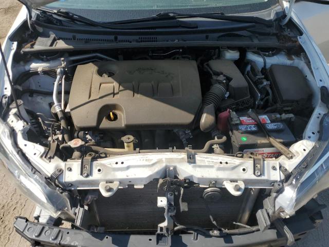 5YFBURHE7JP760161 - 2018 TOYOTA COROLLA L თეთრი ფოტო 11