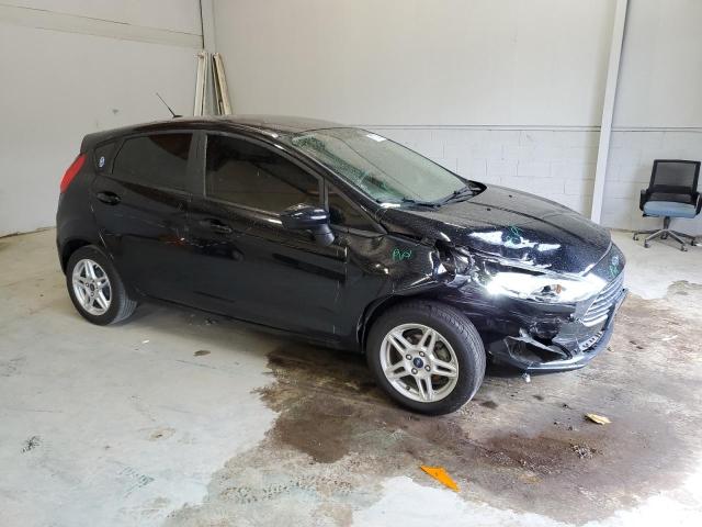 3FADP4EJXKM114387 - 2019 FORD FIESTA SE BLACK photo 4