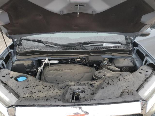 5FNYF8H57PB010844 - 2023 HONDA PASSPORT EXL أزرق صورة 12