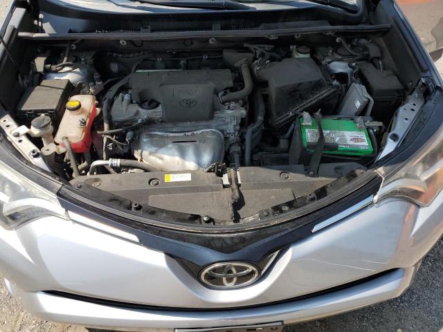 2T3ZFREV4HW333002 - 2017 TOYOTA RAV4 LE SILVER photo 12