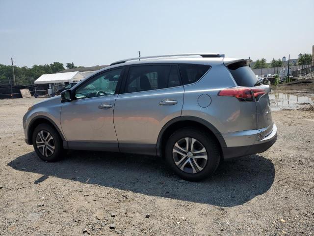 2T3ZFREV4HW333002 - 2017 TOYOTA RAV4 LE SILVER photo 2