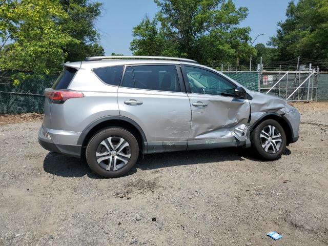 2T3ZFREV4HW333002 - 2017 TOYOTA RAV4 LE SILVER photo 3