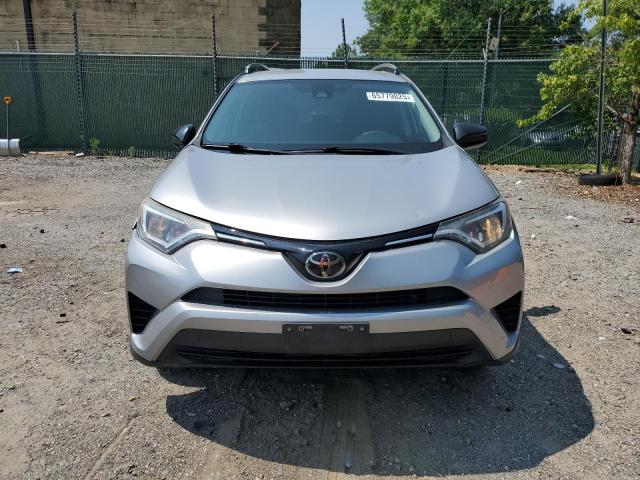 2T3ZFREV4HW333002 - 2017 TOYOTA RAV4 LE SILVER photo 5