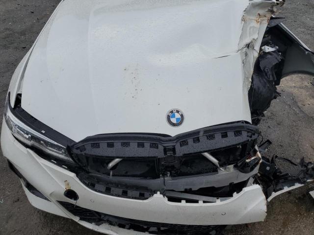 3MW5U9J00M8B92834 - 2021 BMW M340XI WHITE photo 11