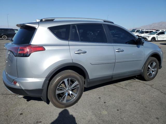 2T3WFREV4GW308909 - 2016 TOYOTA RAV4 XLE ვერცხლისფერი ფოტო 3