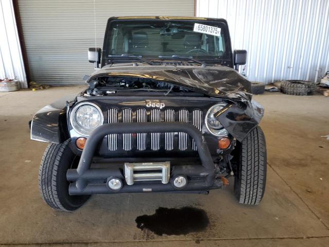 1C4AJWBG0DL634542 - 2013 JEEP WRANGLER SAHARA შავი ფოტო 5