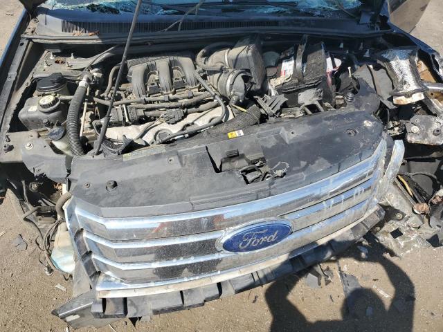 1FMDK02W19GA02742 - 2009 FORD TAURUS X SEL BLACK photo 11