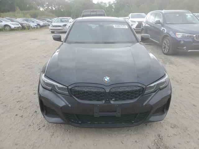 3MW5U9J02N8C61718 - 2022 BMW M340XI BLACK photo 5