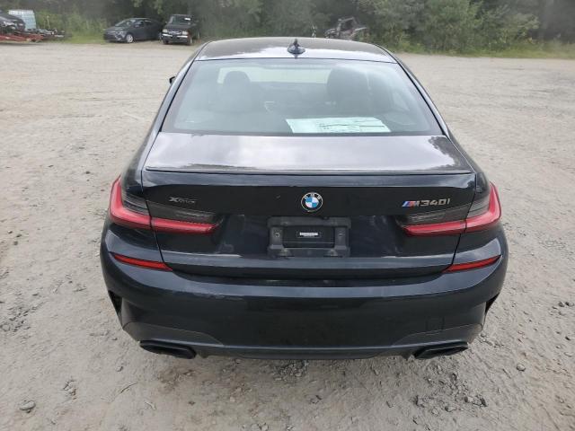 3MW5U9J02N8C61718 - 2022 BMW M340XI BLACK photo 6