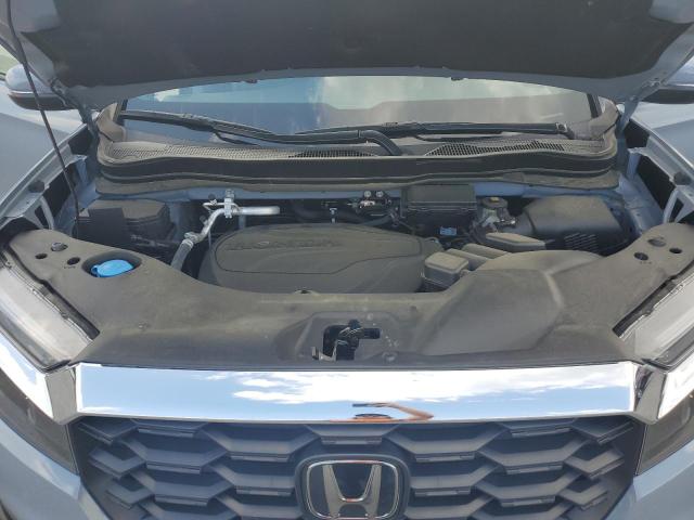 5FNYF8H55PB042580 - 2023 HONDA PASSPORT EXL BLUE photo 12