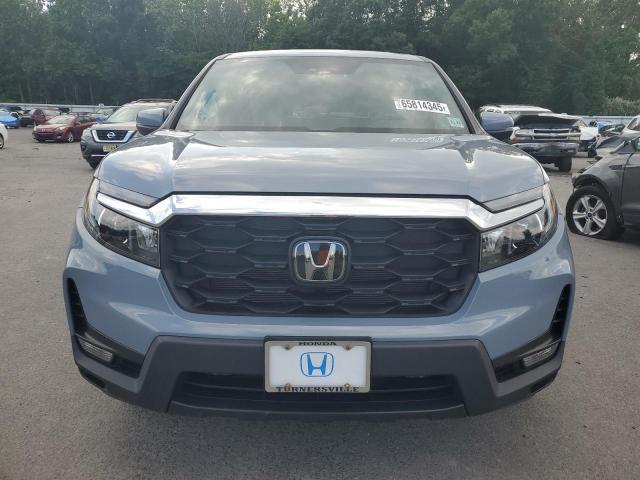 5FNYF8H55PB042580 - 2023 HONDA PASSPORT EXL BLUE photo 5