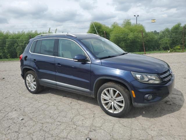 WVGAV7AX4GW557040 - 2016 VOLKSWAGEN TIGUAN S BLUE photo 4