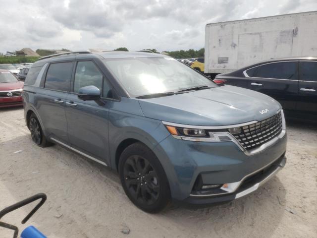 KNDNE5H34P6298790 - 2023 KIA CARNIVAL SX TEAL photo 4