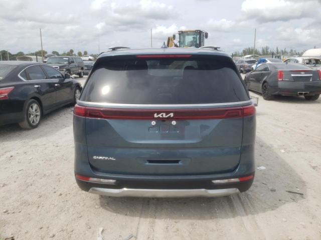 KNDNE5H34P6298790 - 2023 KIA CARNIVAL SX TEAL photo 6