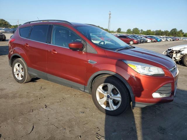 1FMCU0GX0GUC06132 - 2016 FORD ESCAPE SE ORANGE photo 4