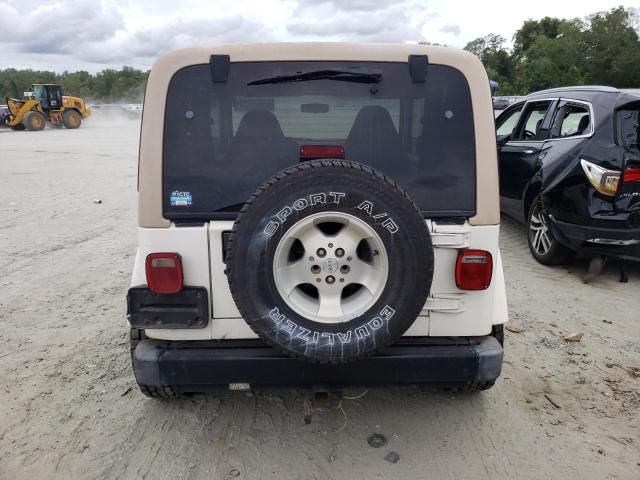 1J4FY49S1XP489776 - 1999 JEEP WRANGLER / SAHARA WHITE photo 6